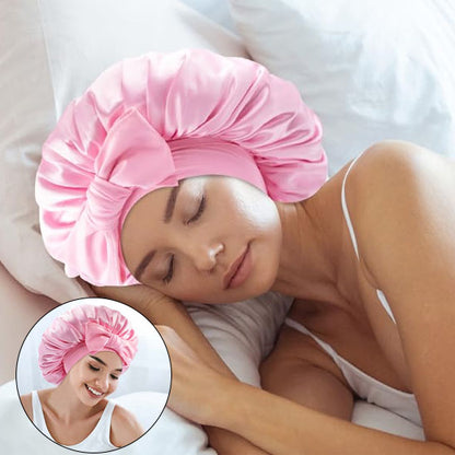 Bonnet rose en satin offrant confort et protection des cheveux contre les nœuds indésirable pendant la nuit